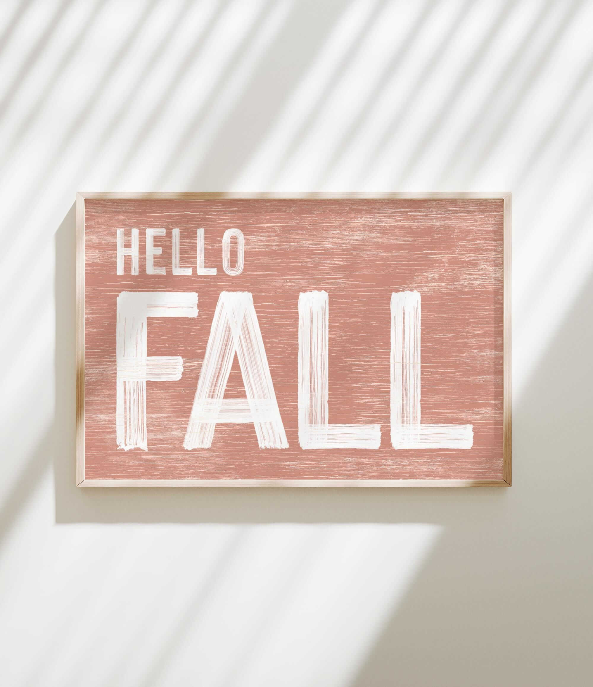 a wooden sign that says hello fall