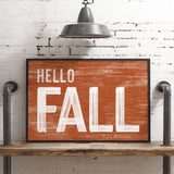 a wooden sign that says hello fall on it