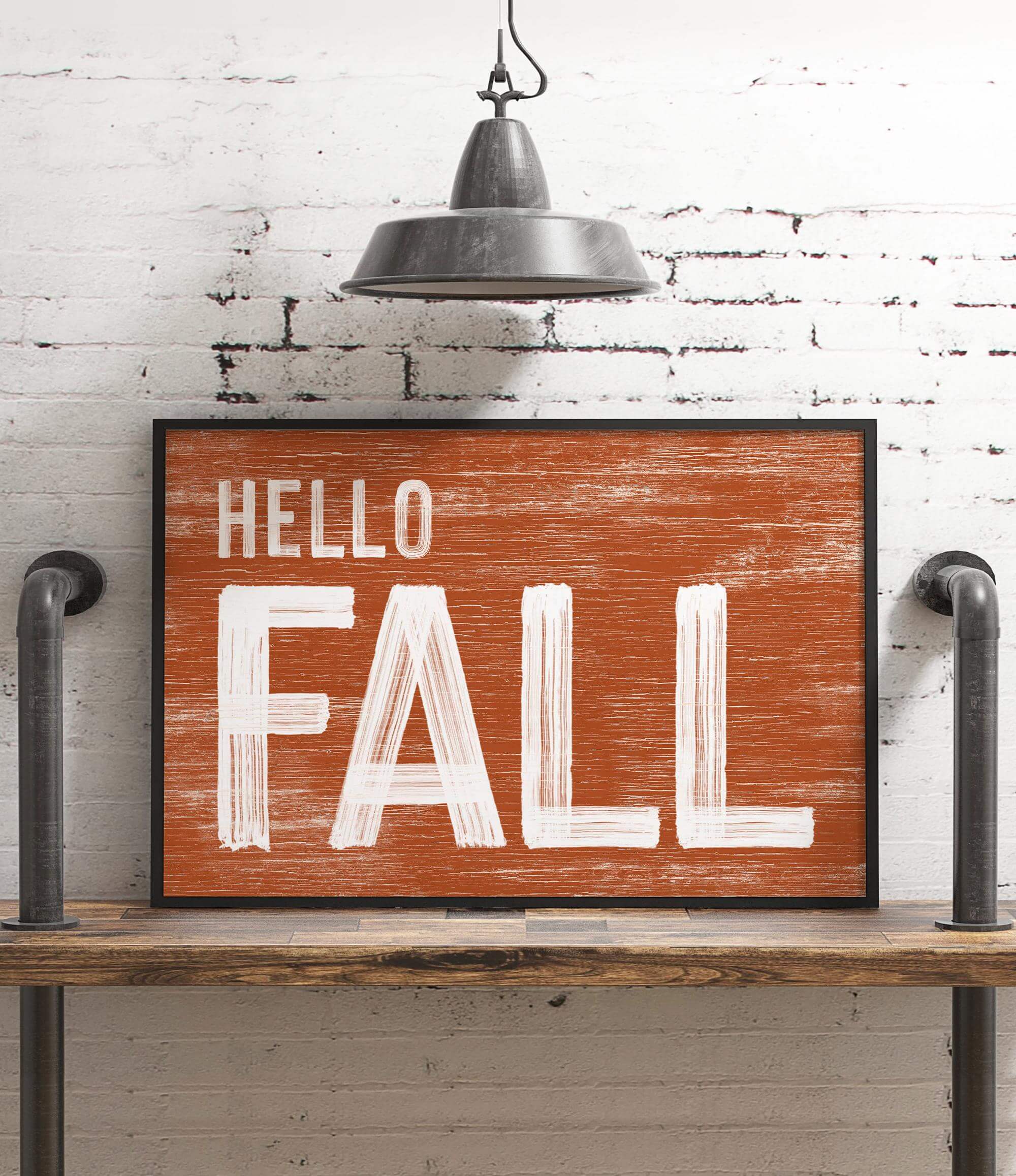 a wooden sign that says hello fall on it