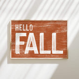 a wooden sign that says hello fall