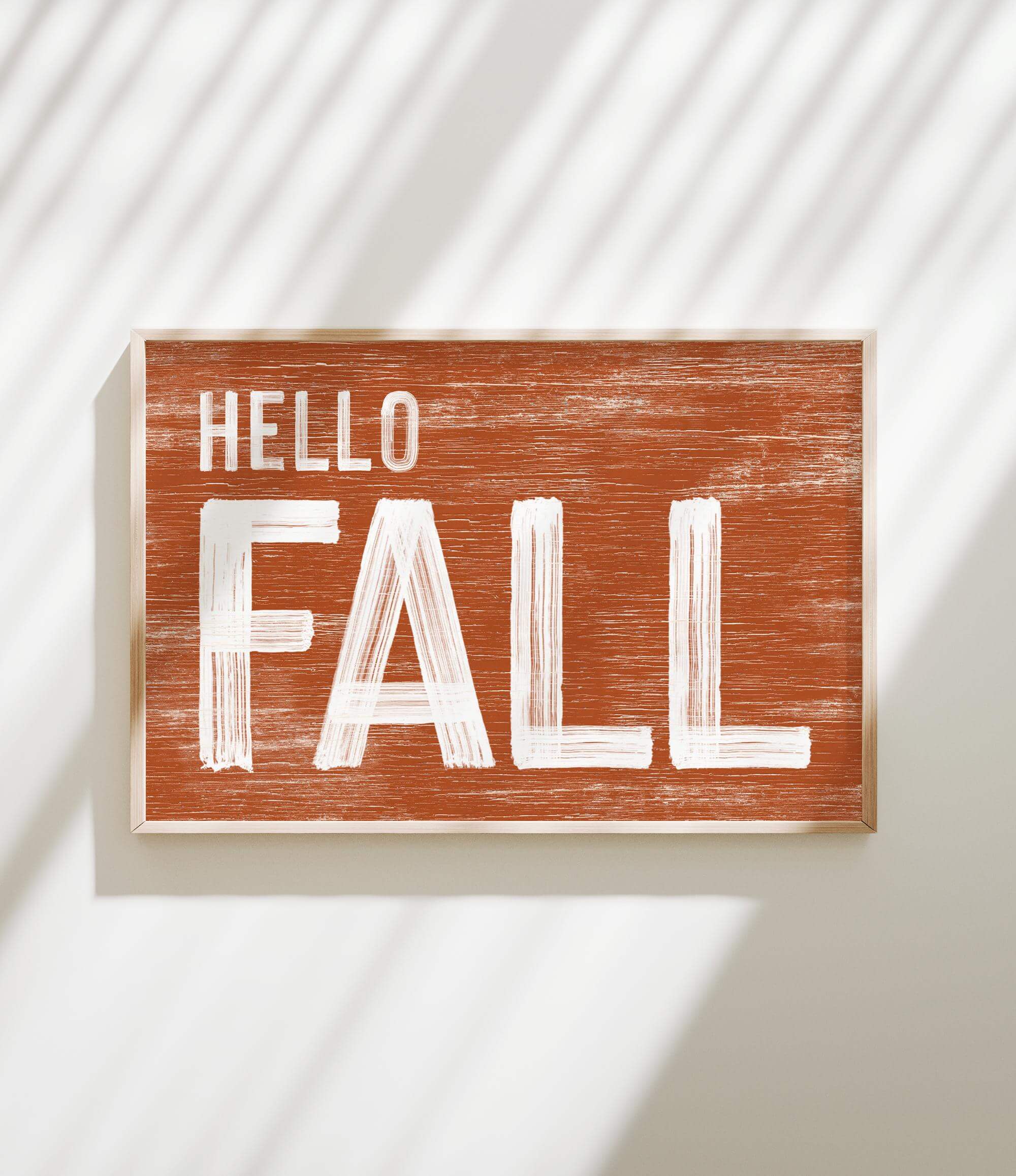 a wooden sign that says hello fall