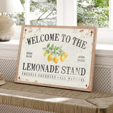 a welcome to the lemonade stand sign on a bench