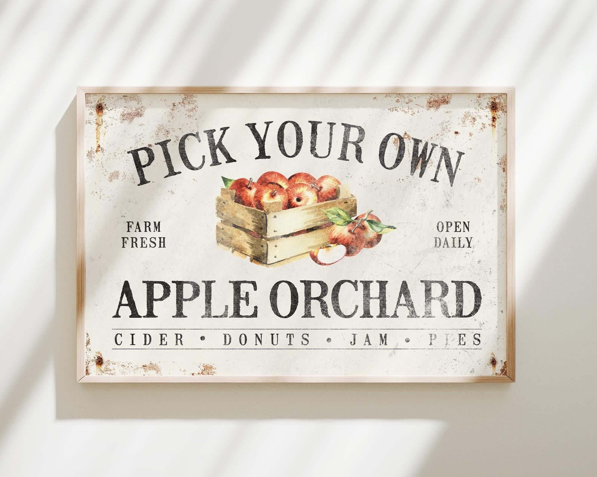 a sign that says pick your own apple orchard