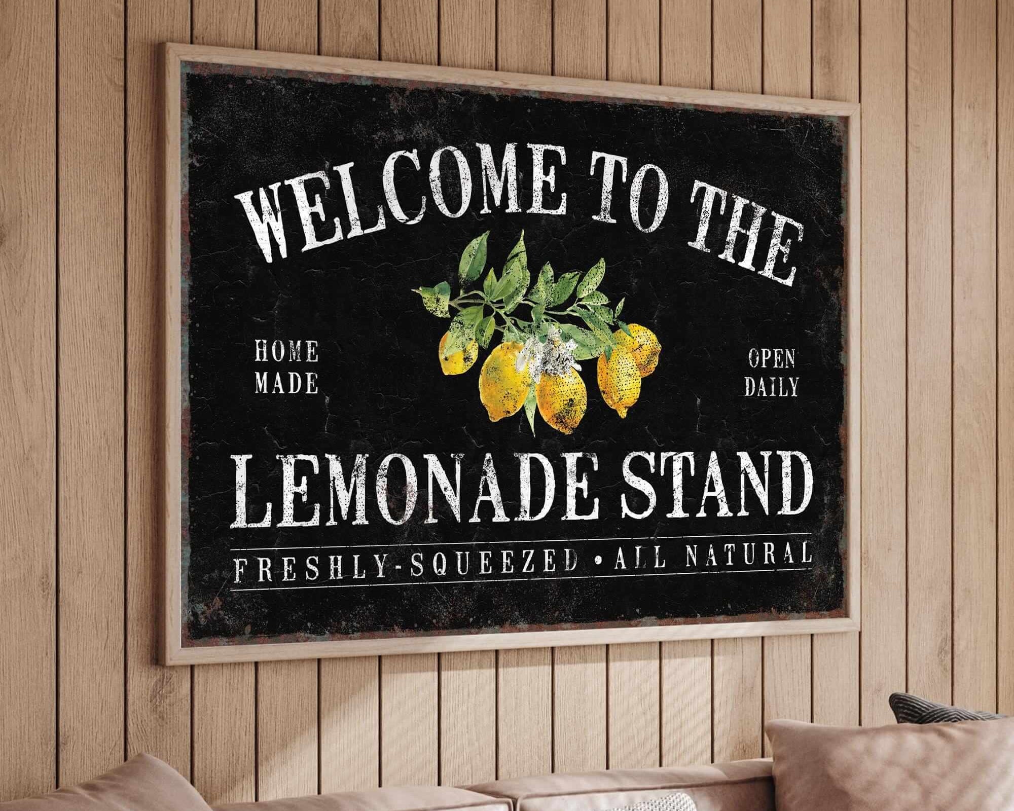 a welcome to the lemonade stand sign hanging on a wall