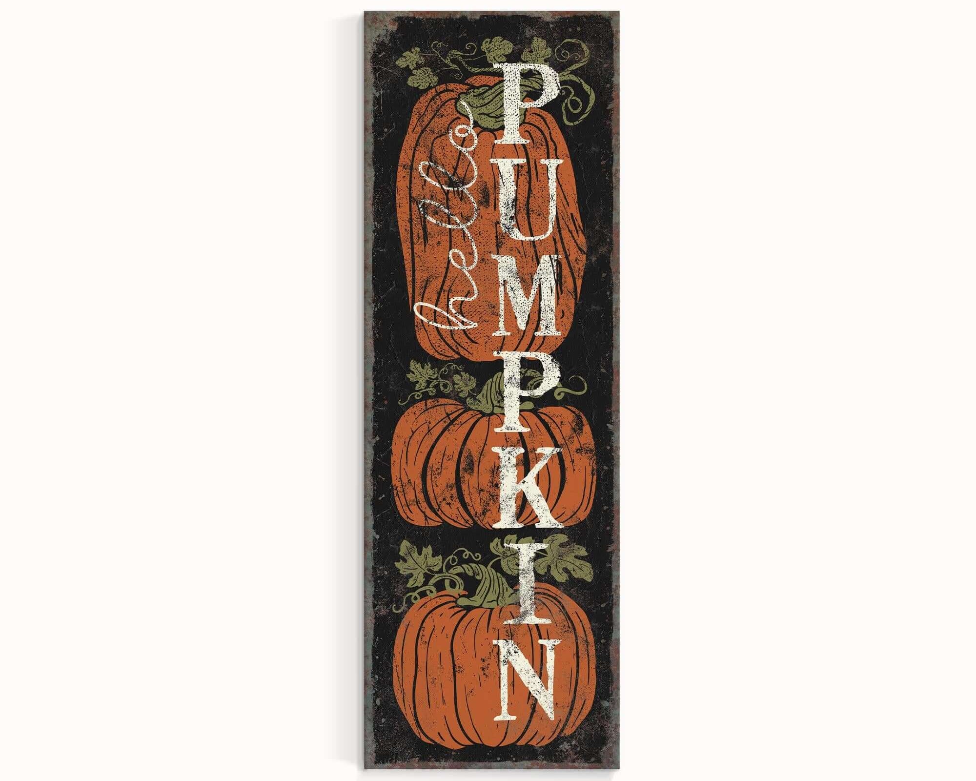 a wooden sign with pumpkins on it