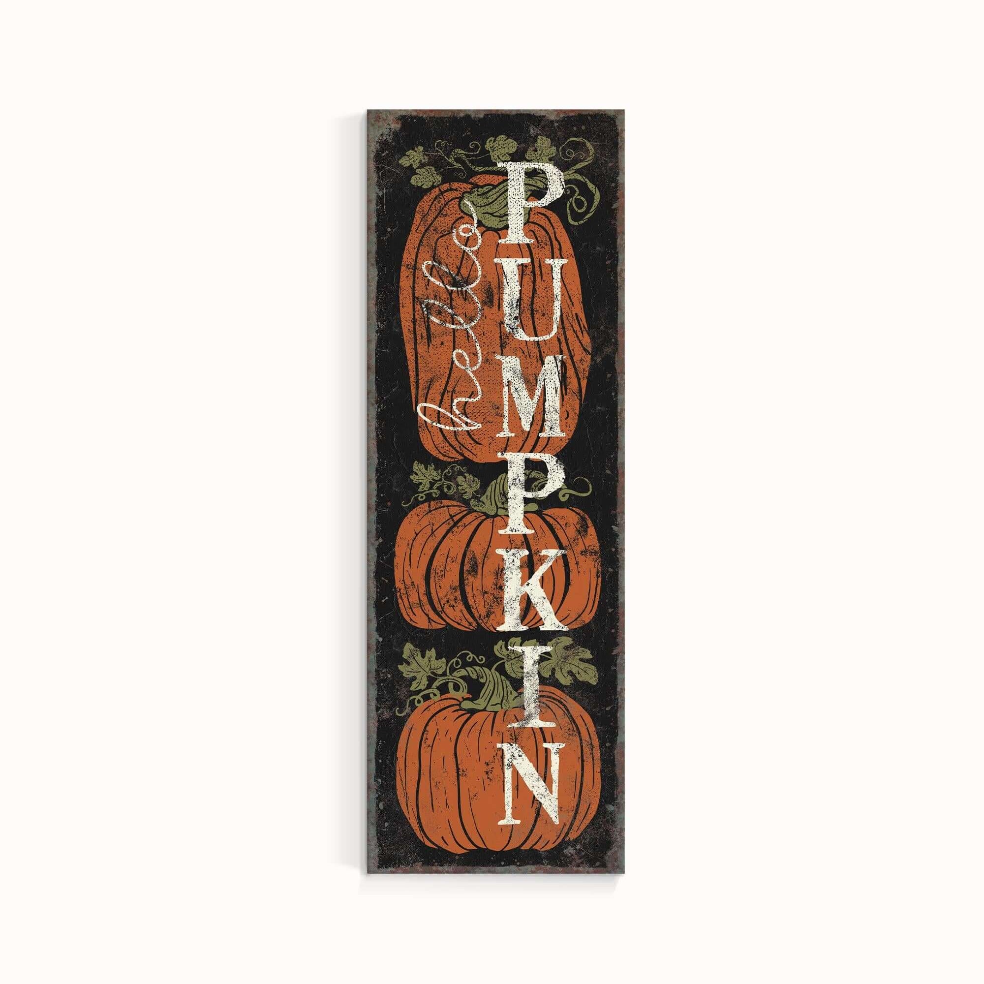 a wooden sign with pumpkins on it