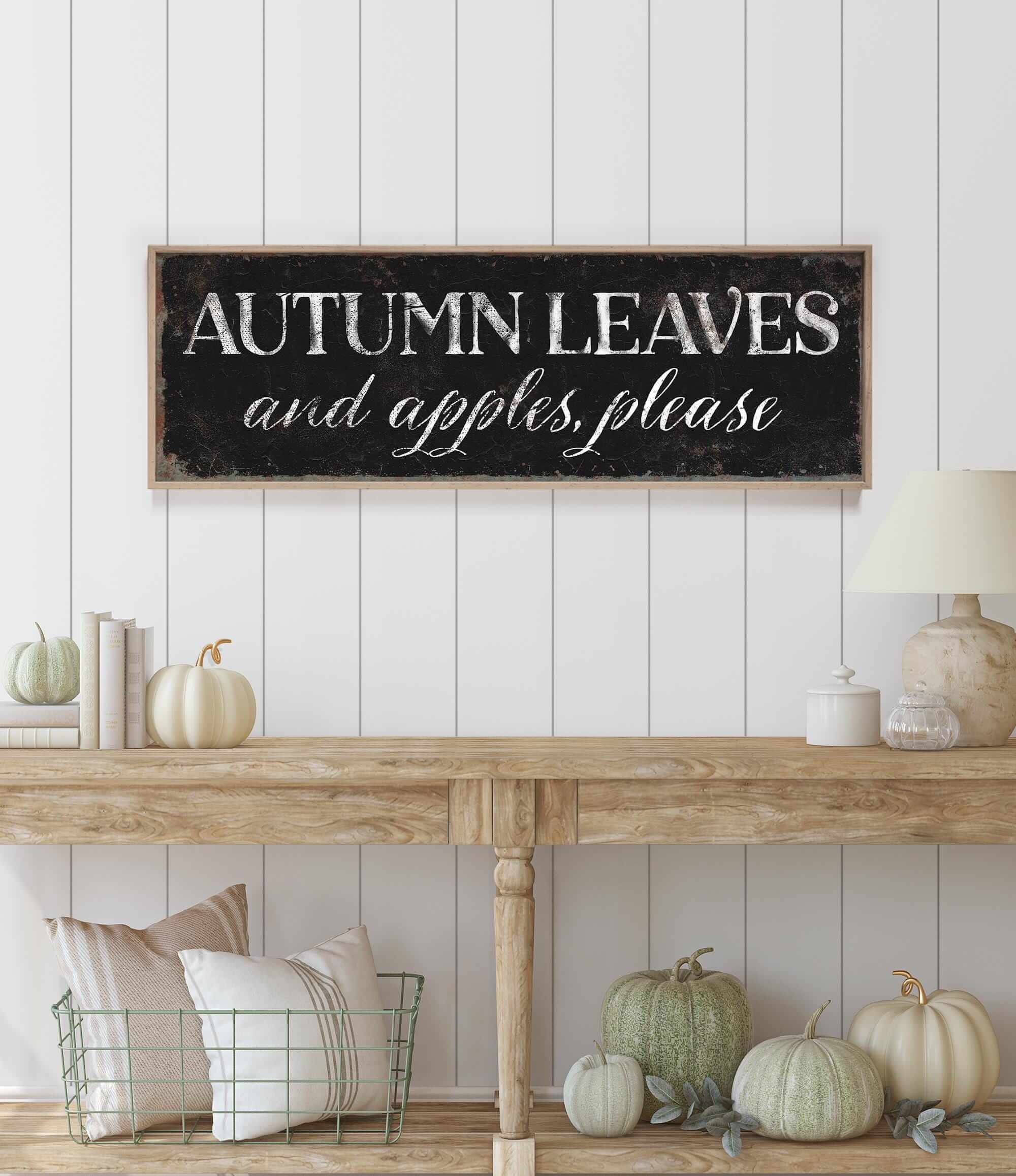 a wooden sign that says autumn leaves and apples please