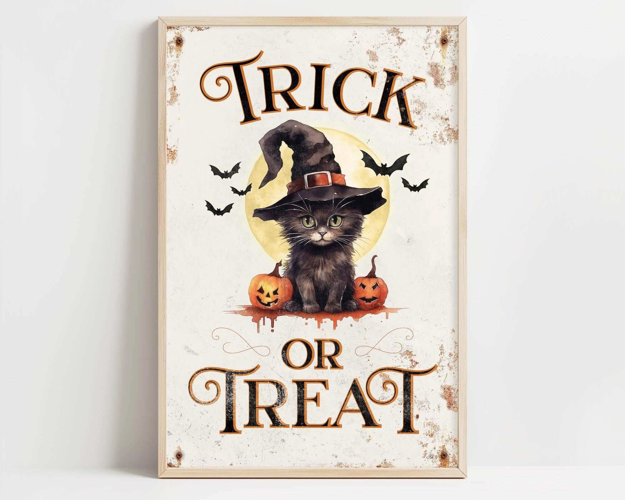 a trick or treat sign with a cat wearing a witches hat