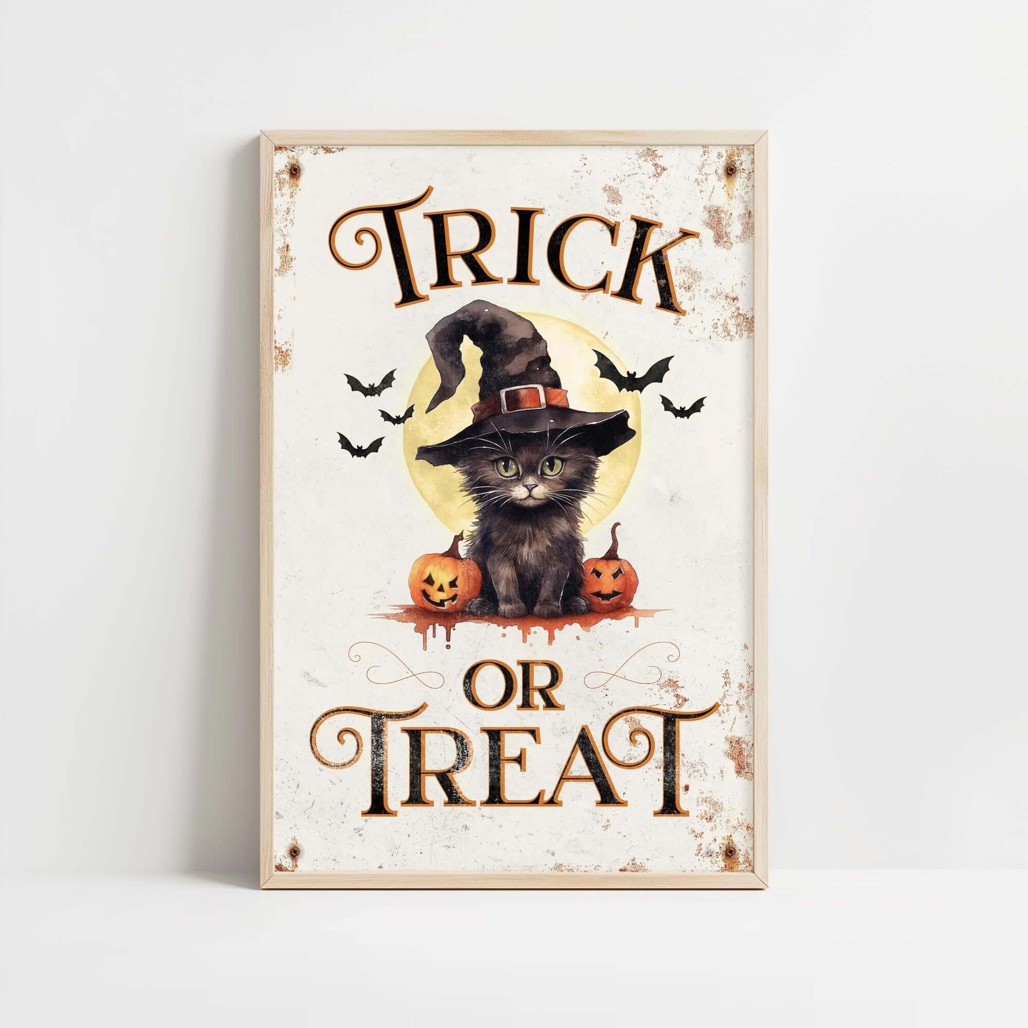a trick or treat sign with a cat wearing a witches hat