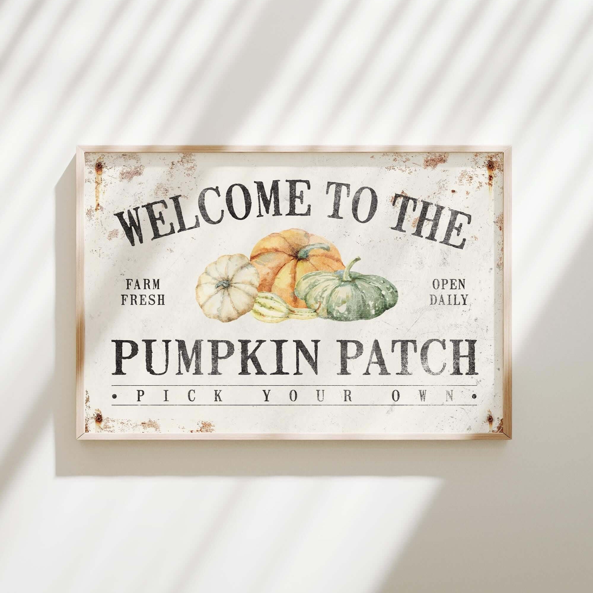 a sign that says welcome to the pumpkin patch