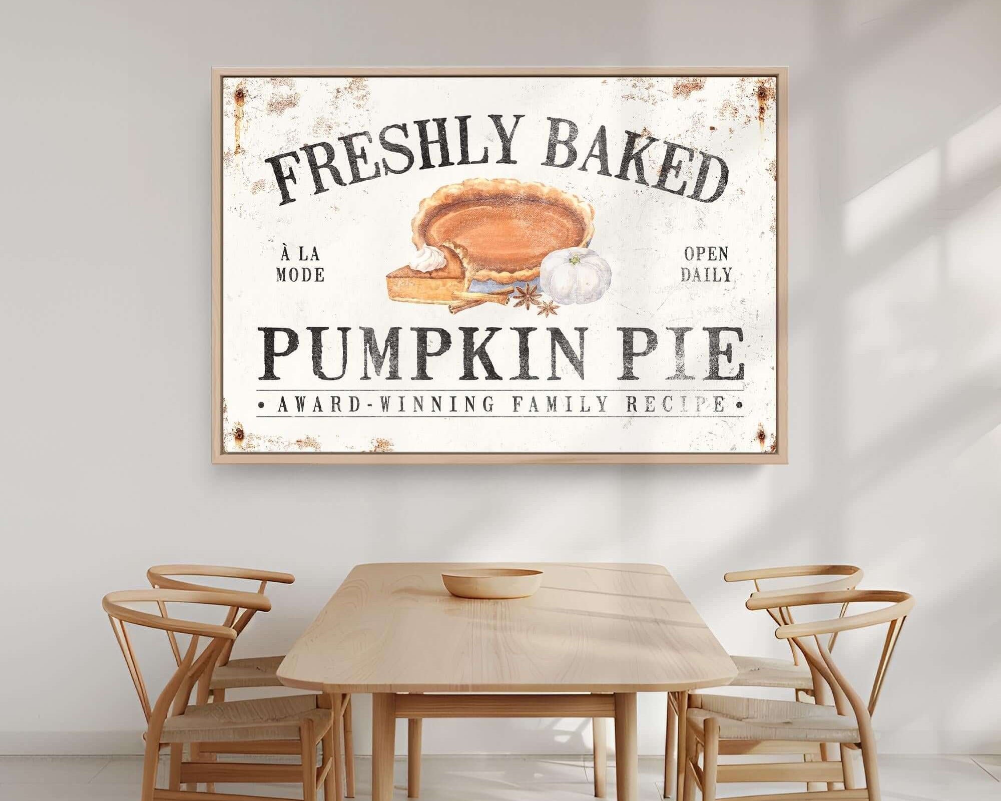 a table and chairs in a room with a sign on the wall