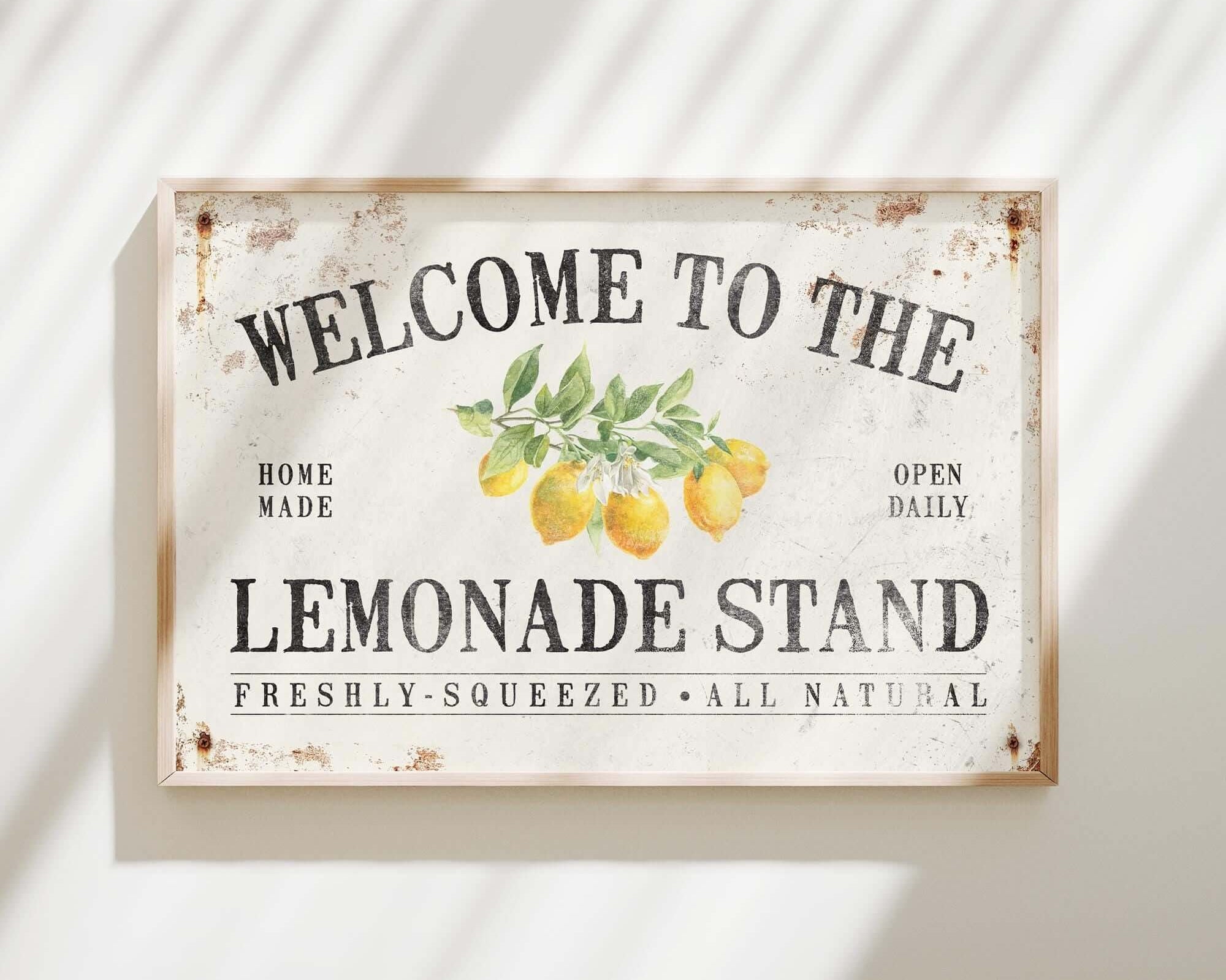 a sign that says welcome to the lemonade stand