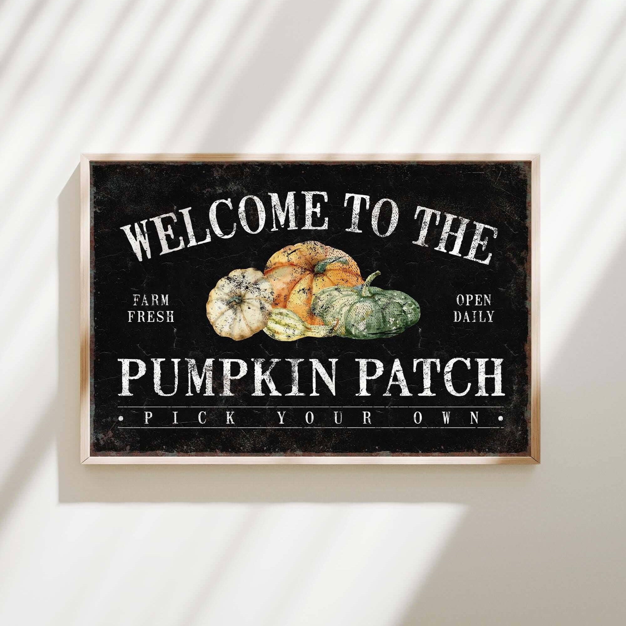 a sign that says welcome to the pumpkin patch