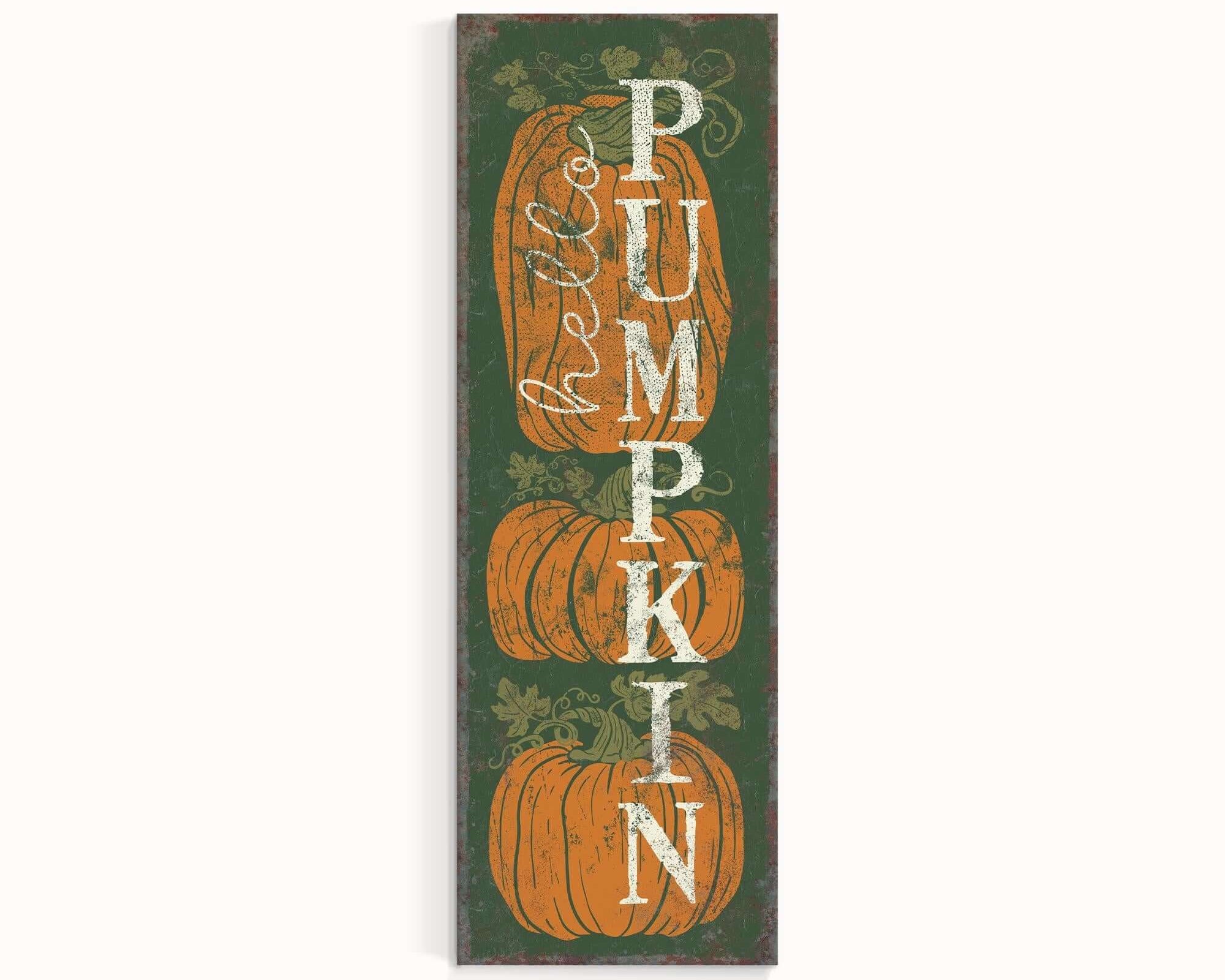 a wooden sign with pumpkins on it