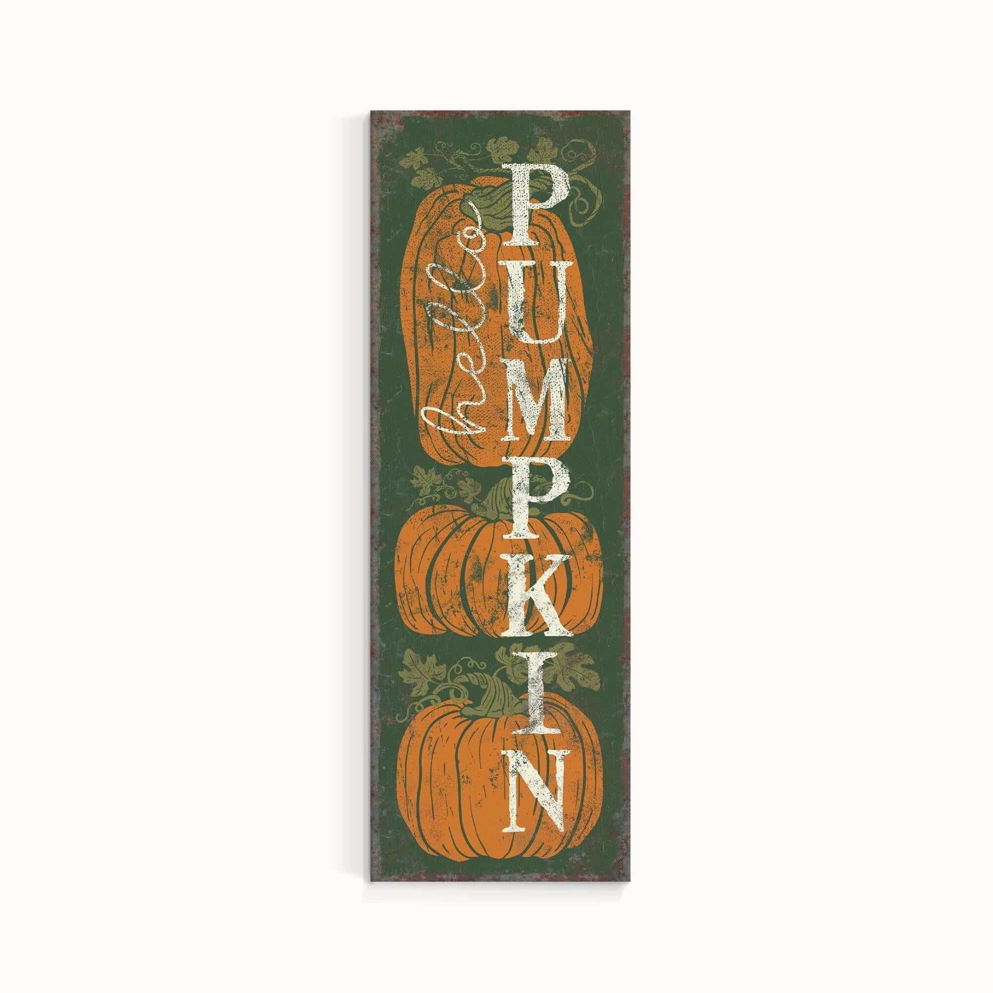 a wooden sign with pumpkins on it