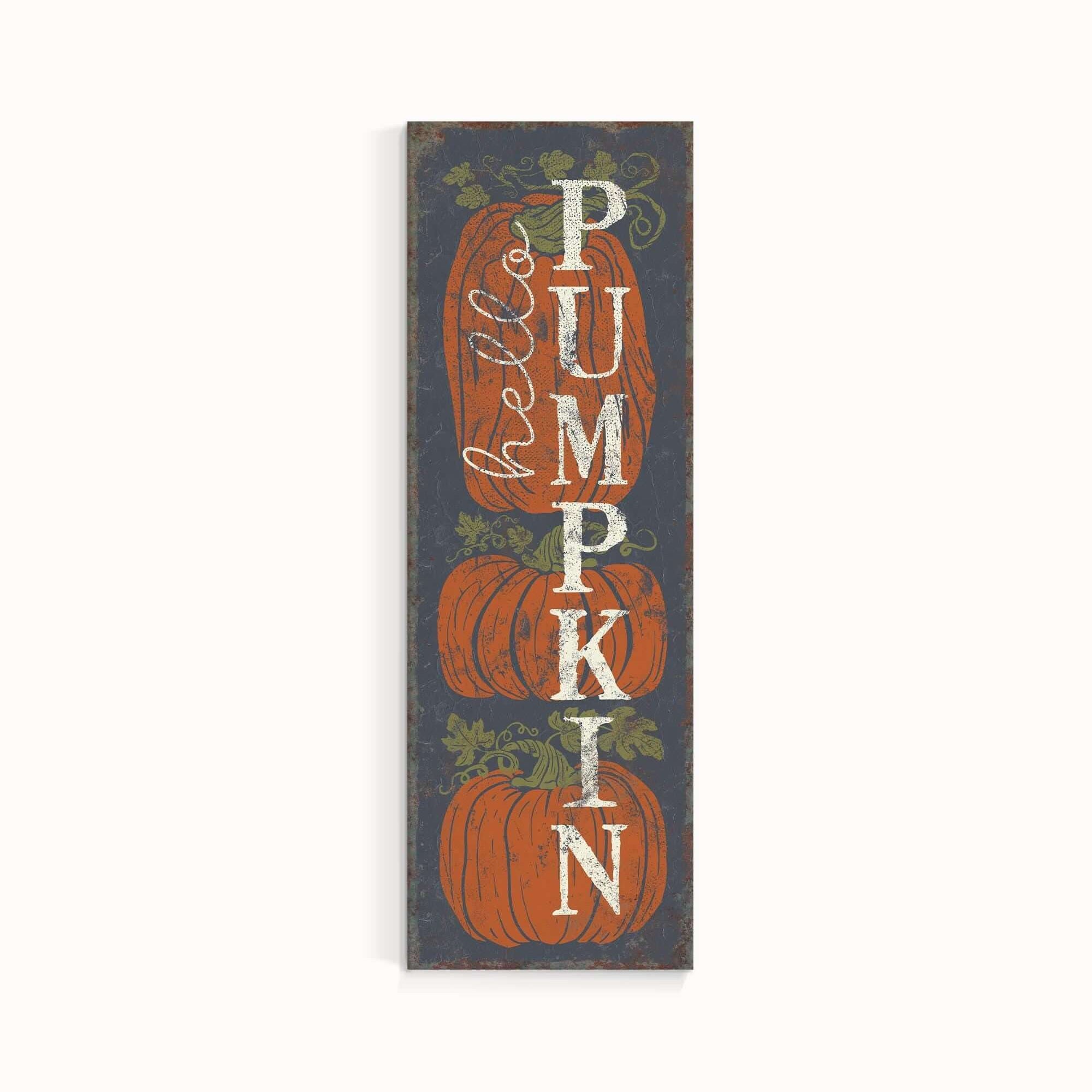 a wooden sign with pumpkins on it