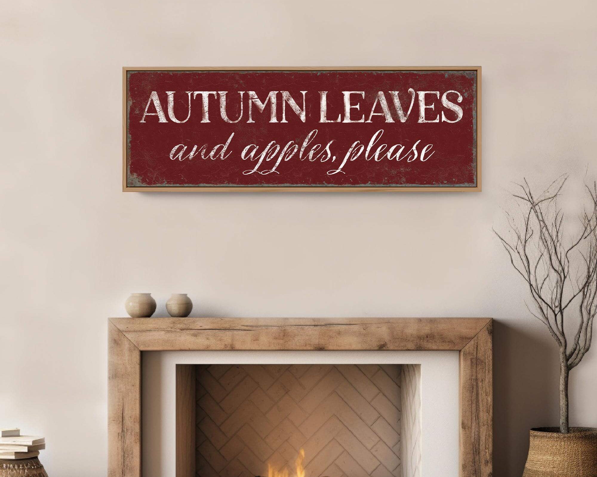 a fireplace with a sign above it that says autumn leaves and apples please
