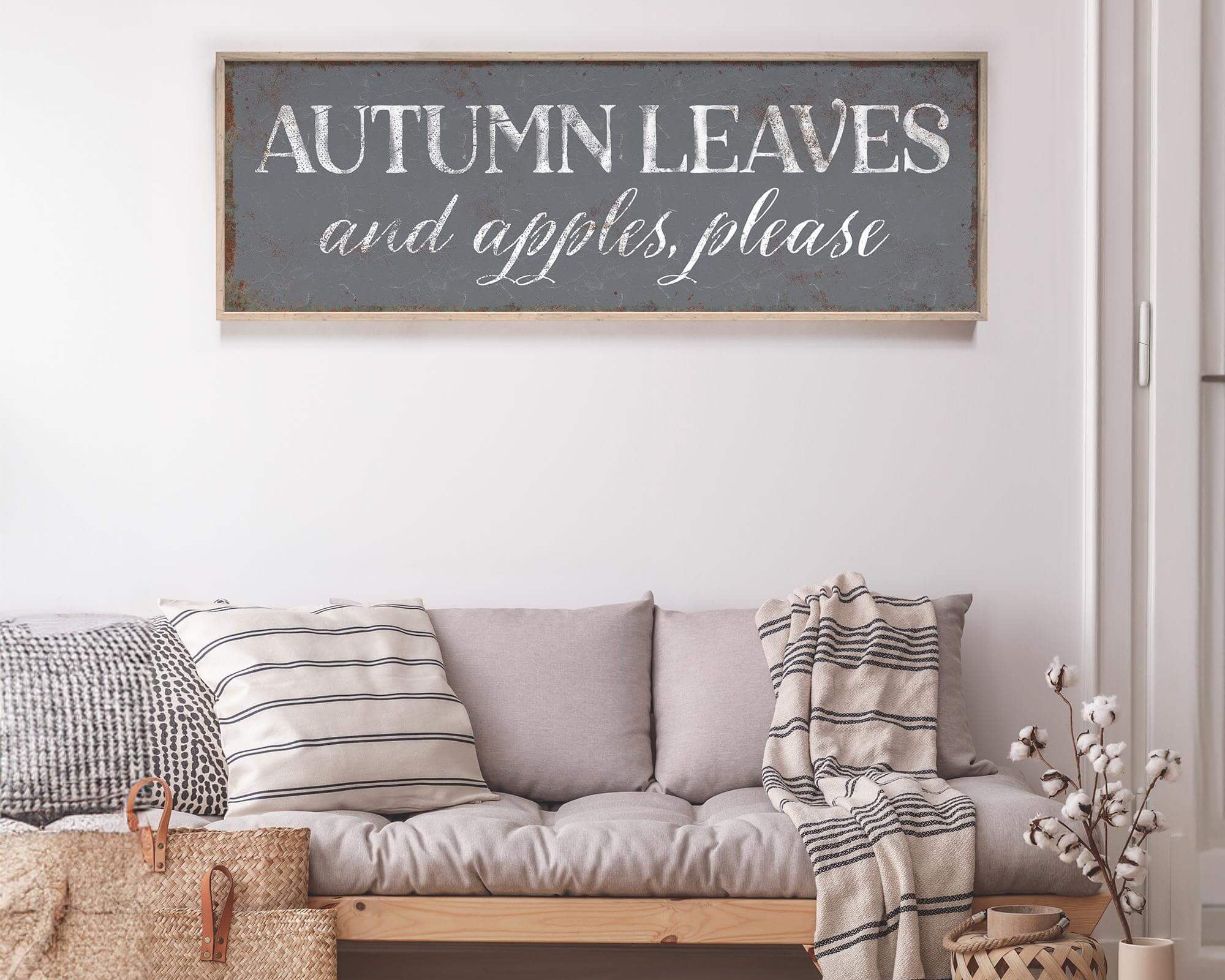 a living room filled with furniture and a wooden sign