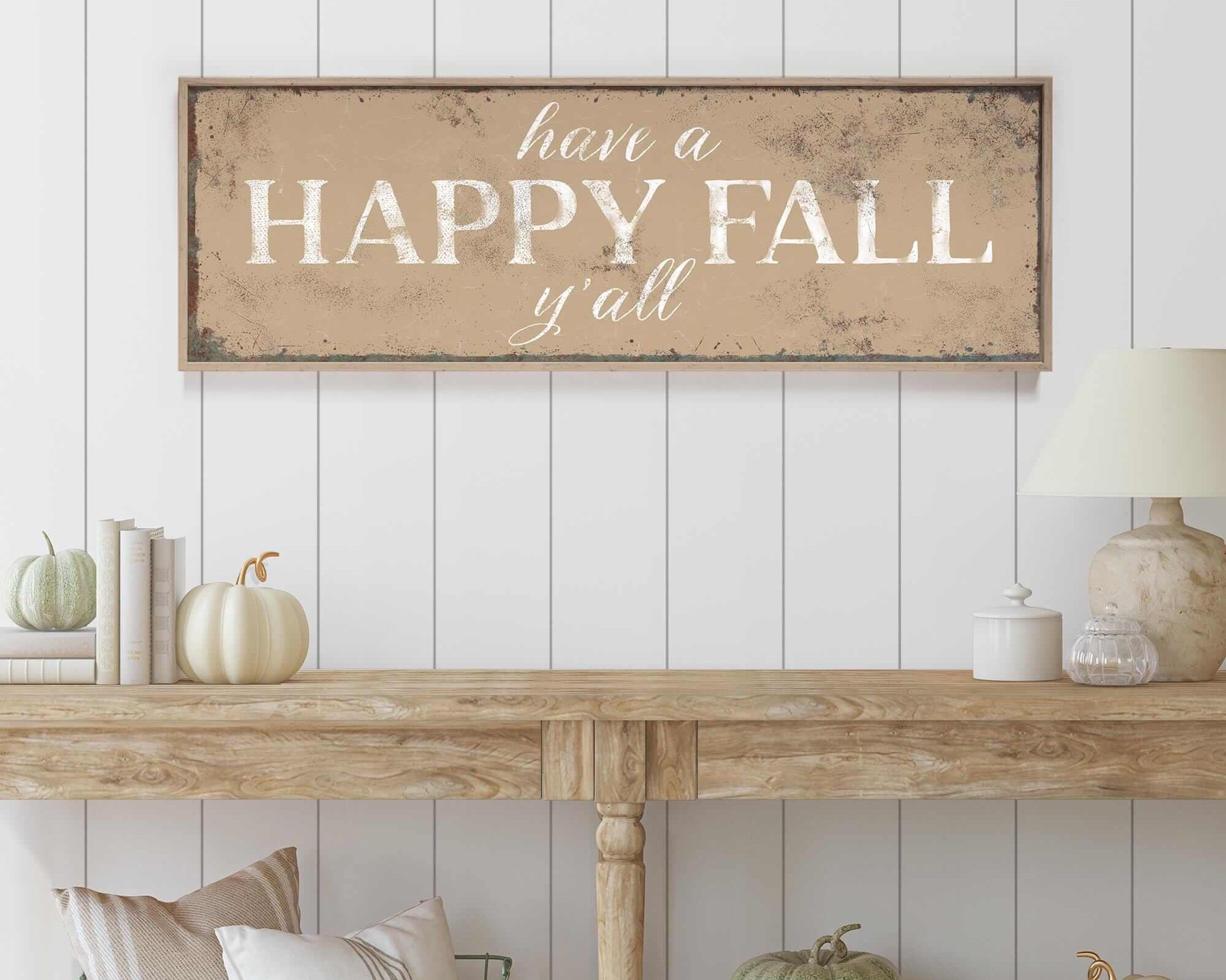 a wooden sign that says have a happy fall y'all