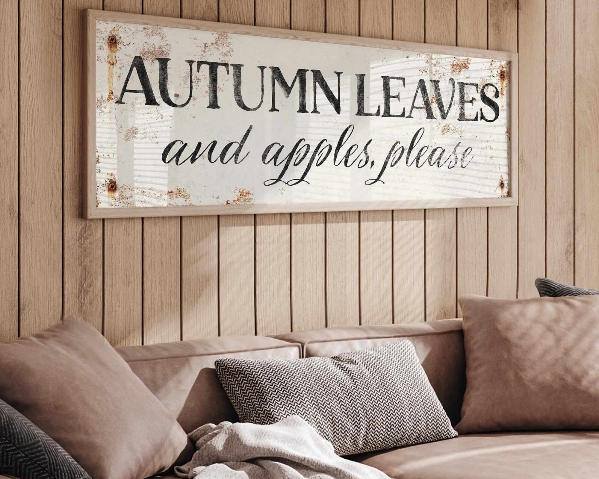 a living room with a couch and a sign on the wall