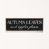 a black and white sign that says autumn leaves and apples please