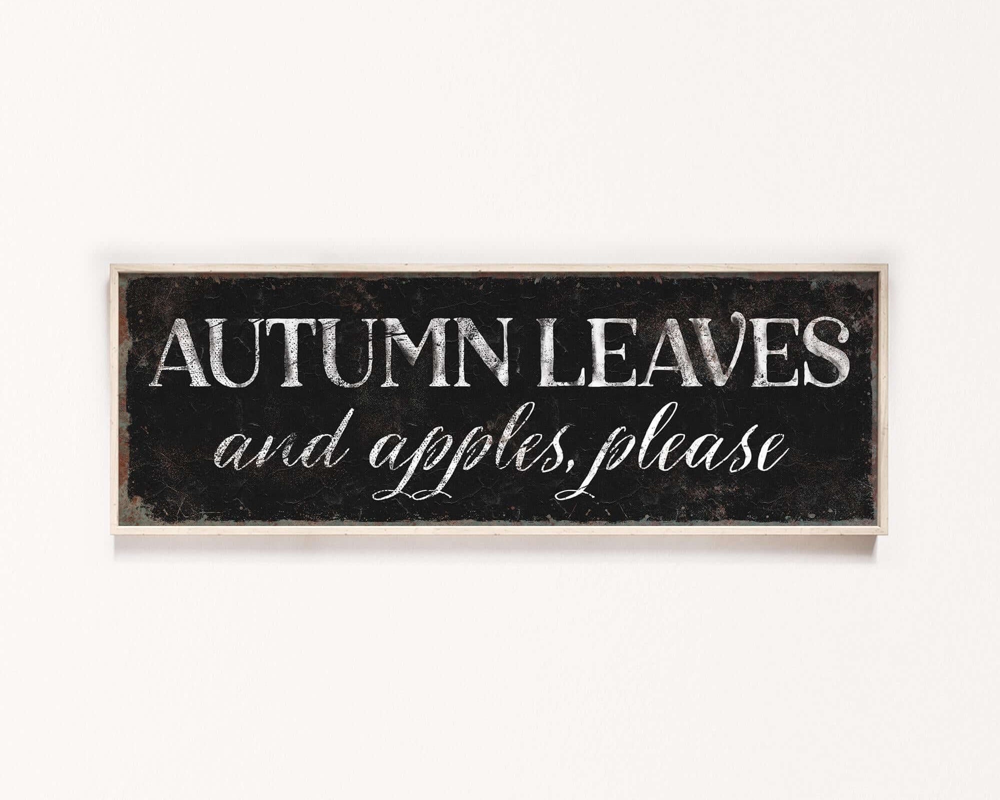 a black and white sign that says autumn leaves and apples please
