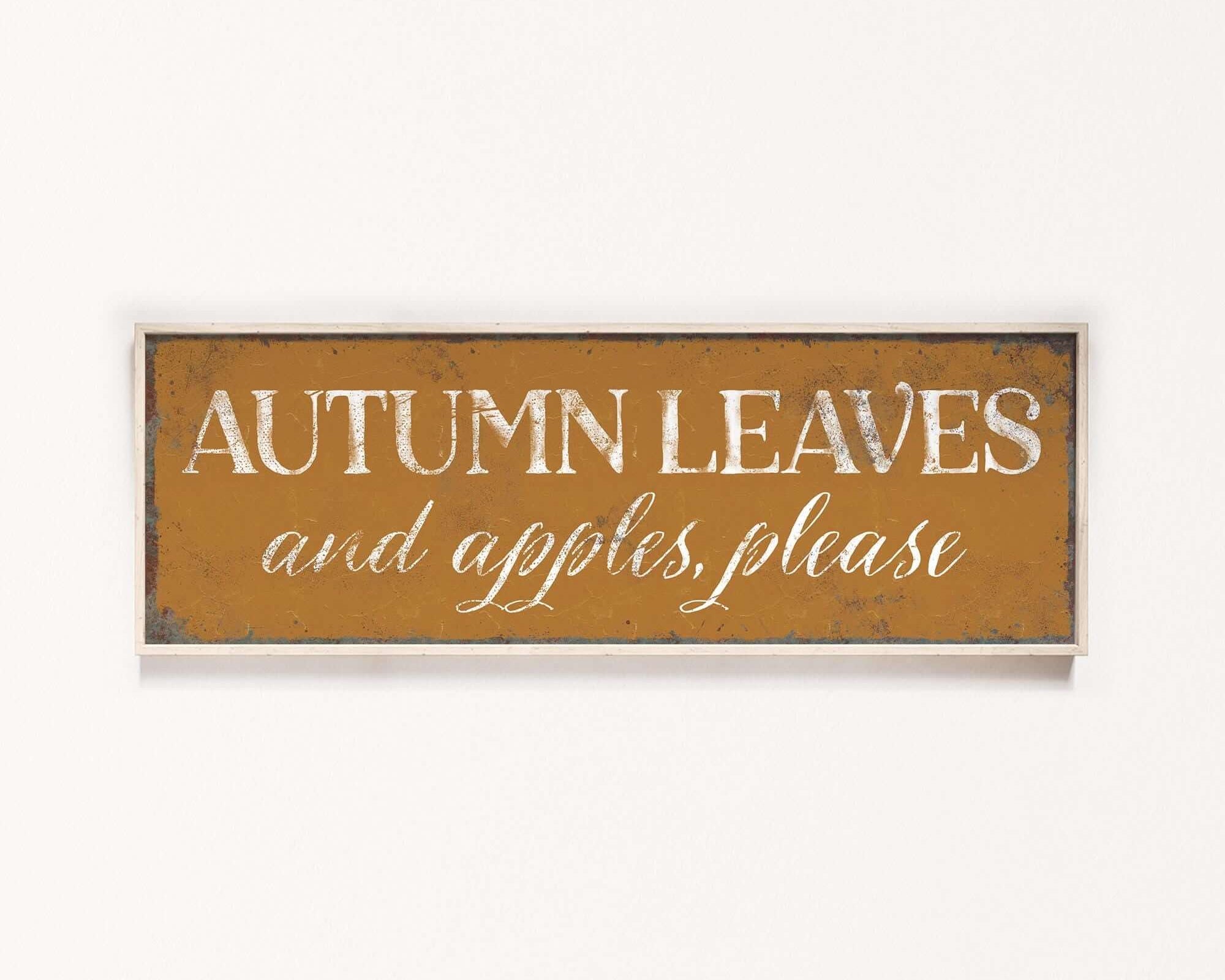 a sign that says autumn leaves and apples please