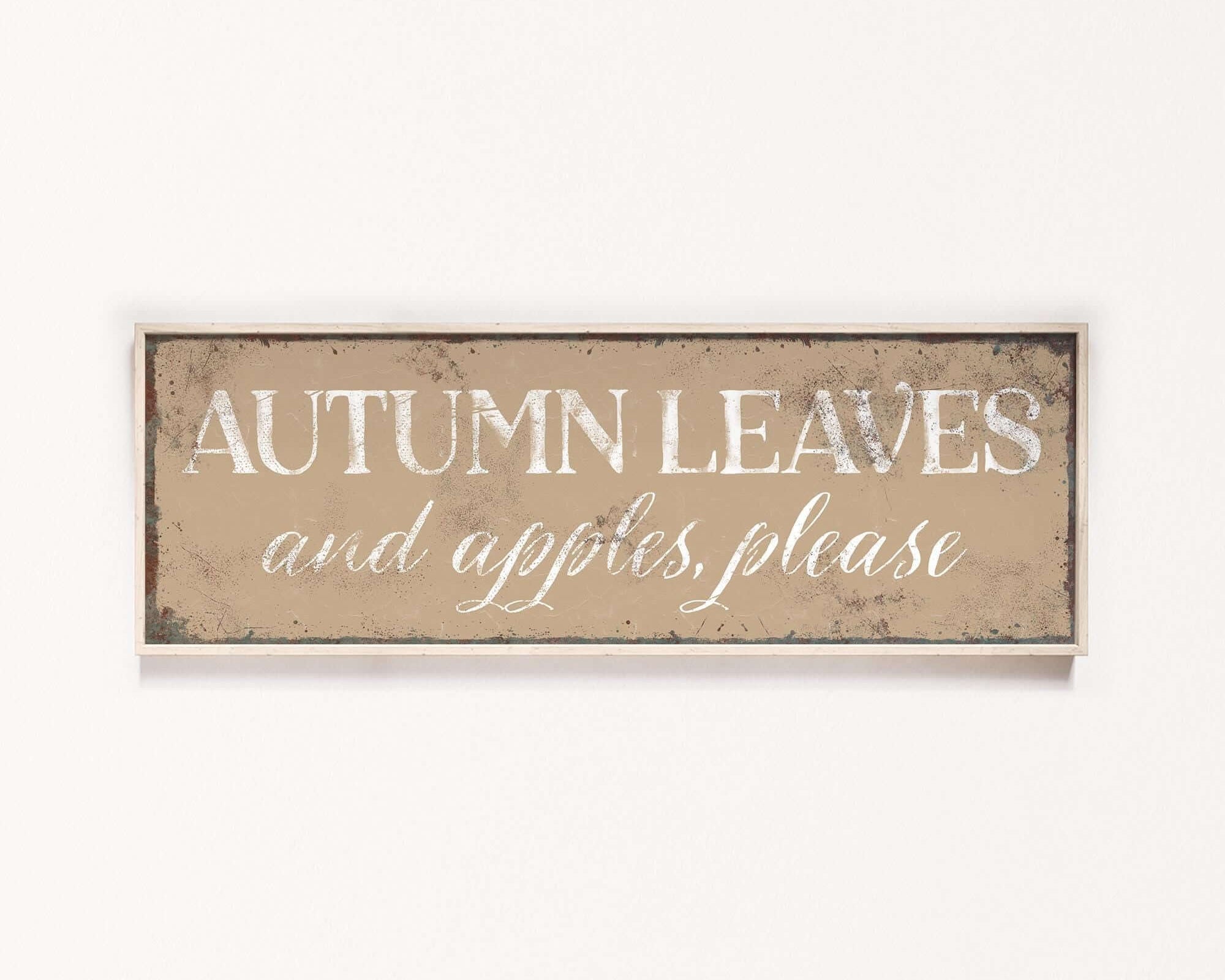 a wooden sign that says autumn leaves and giraffes please