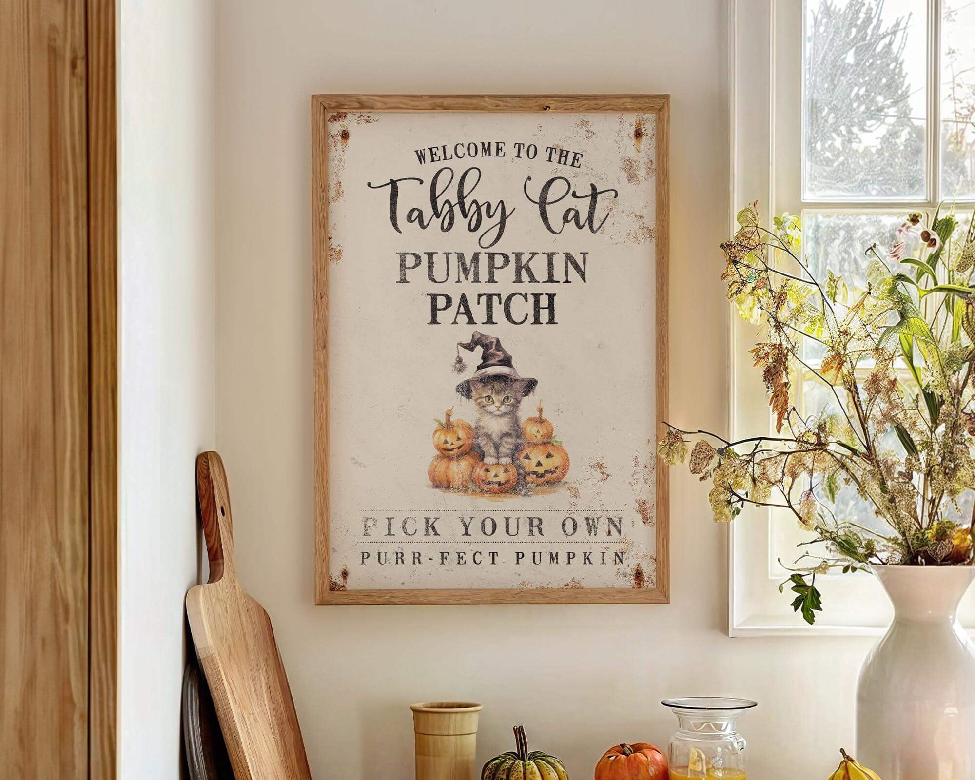 a picture of a kitchen with pumpkins and apples