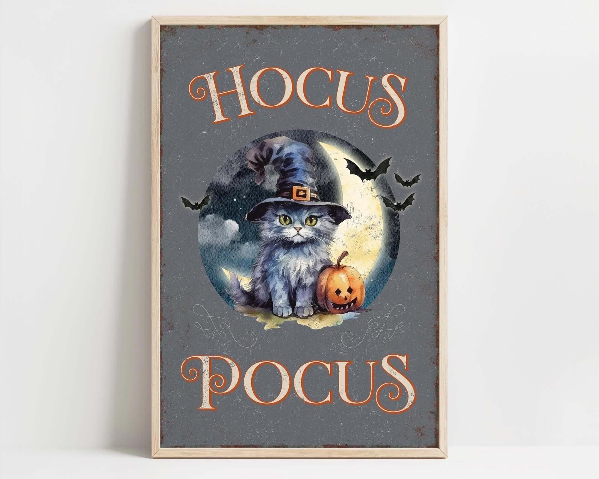 a picture of a cat wearing a witches hat