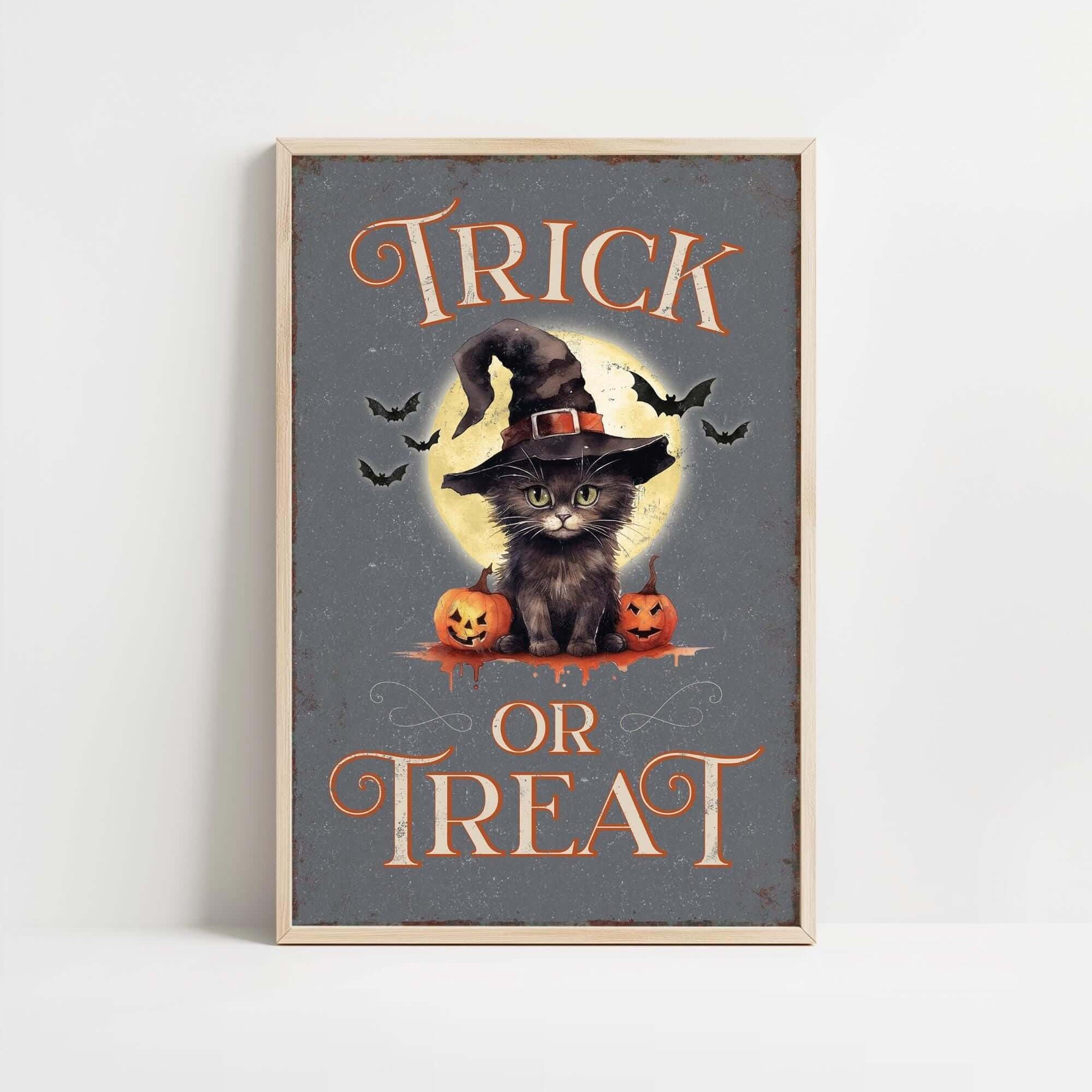 a picture of a cat wearing a witches hat