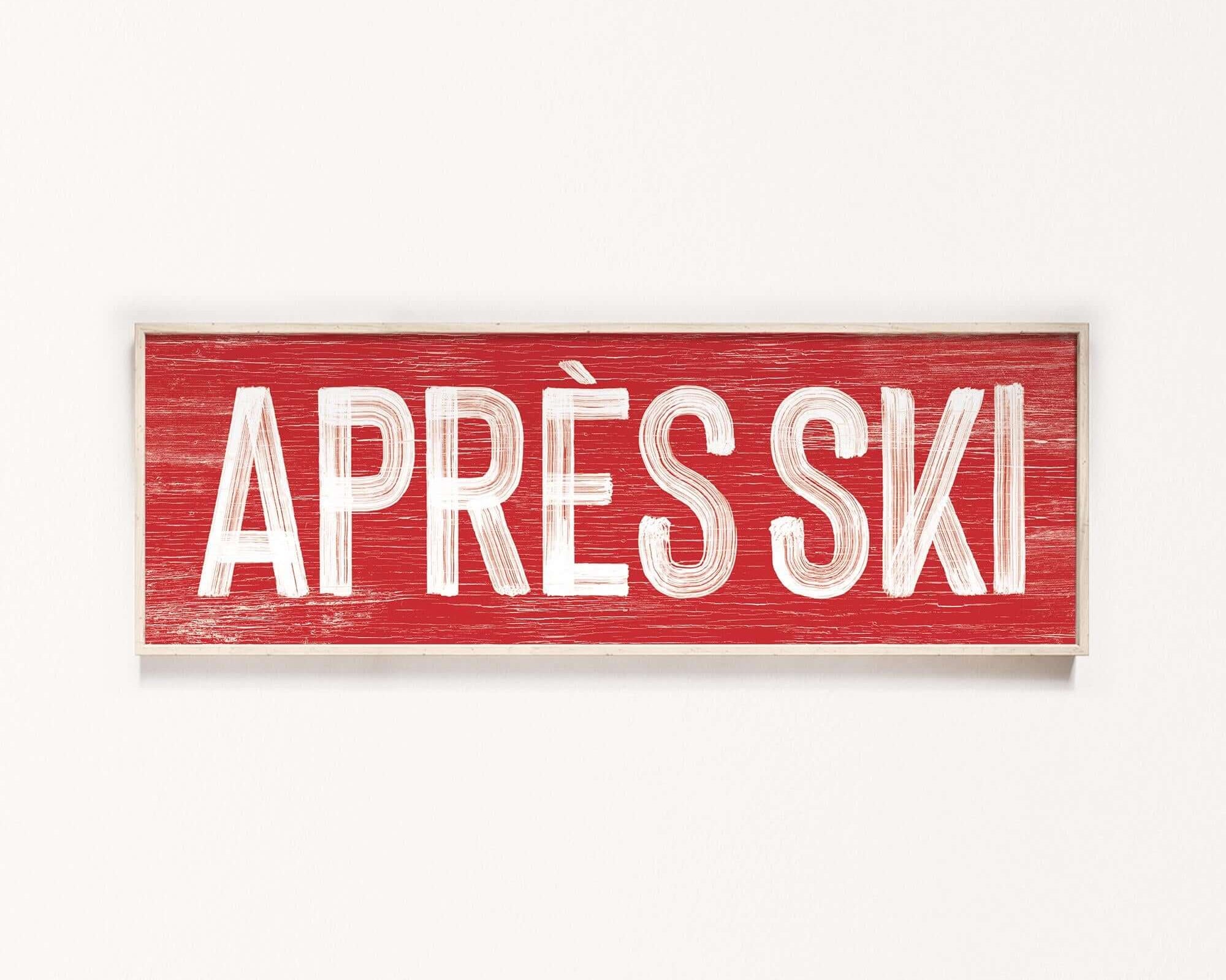 a red sign that says apres ski on a white wall
