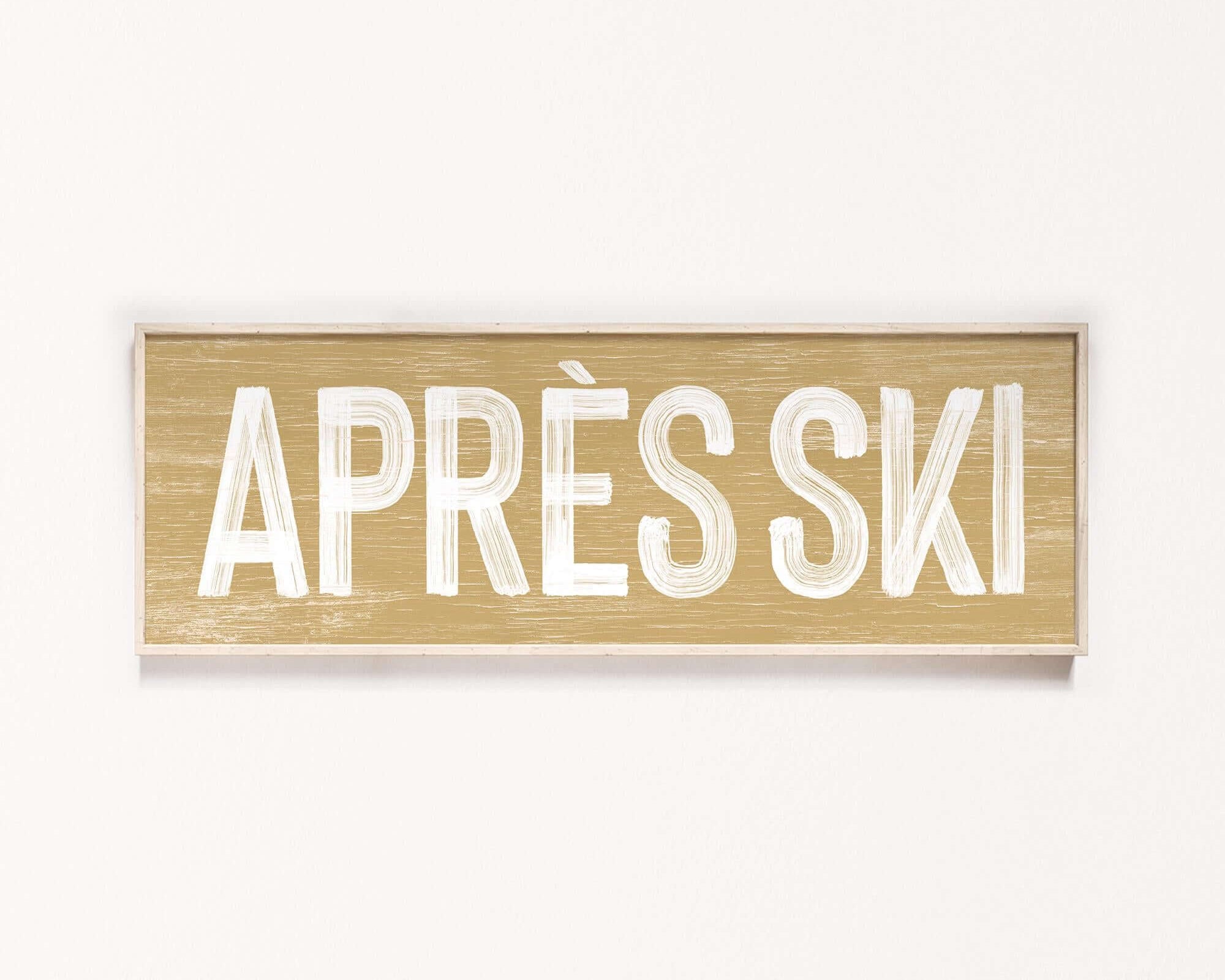 a sign that says apres ski on a white wall