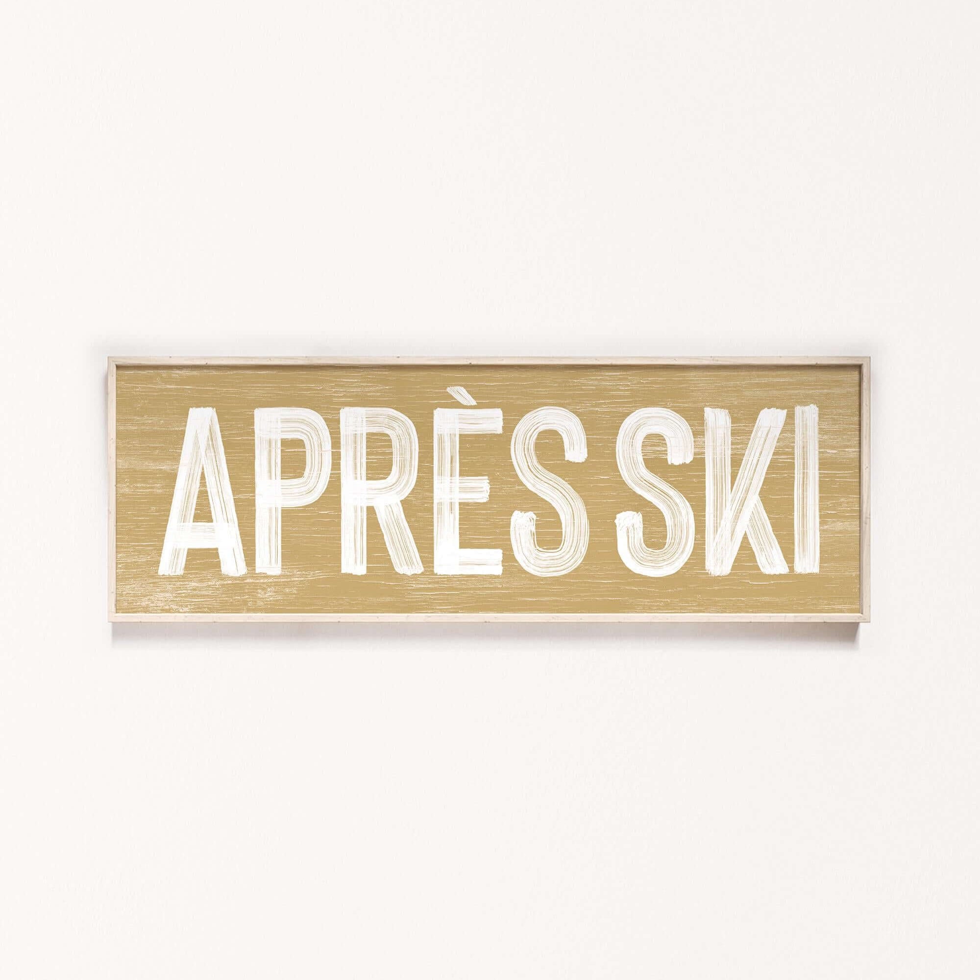 a sign that says apres ski on a white wall
