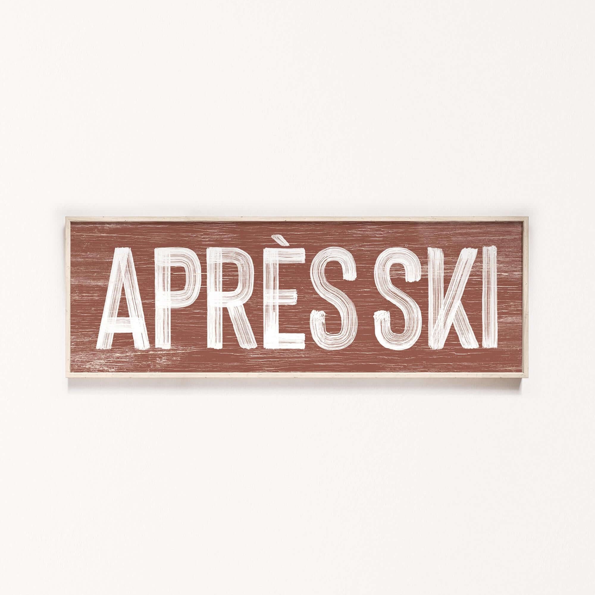 a sign that says apres ski on a white wall